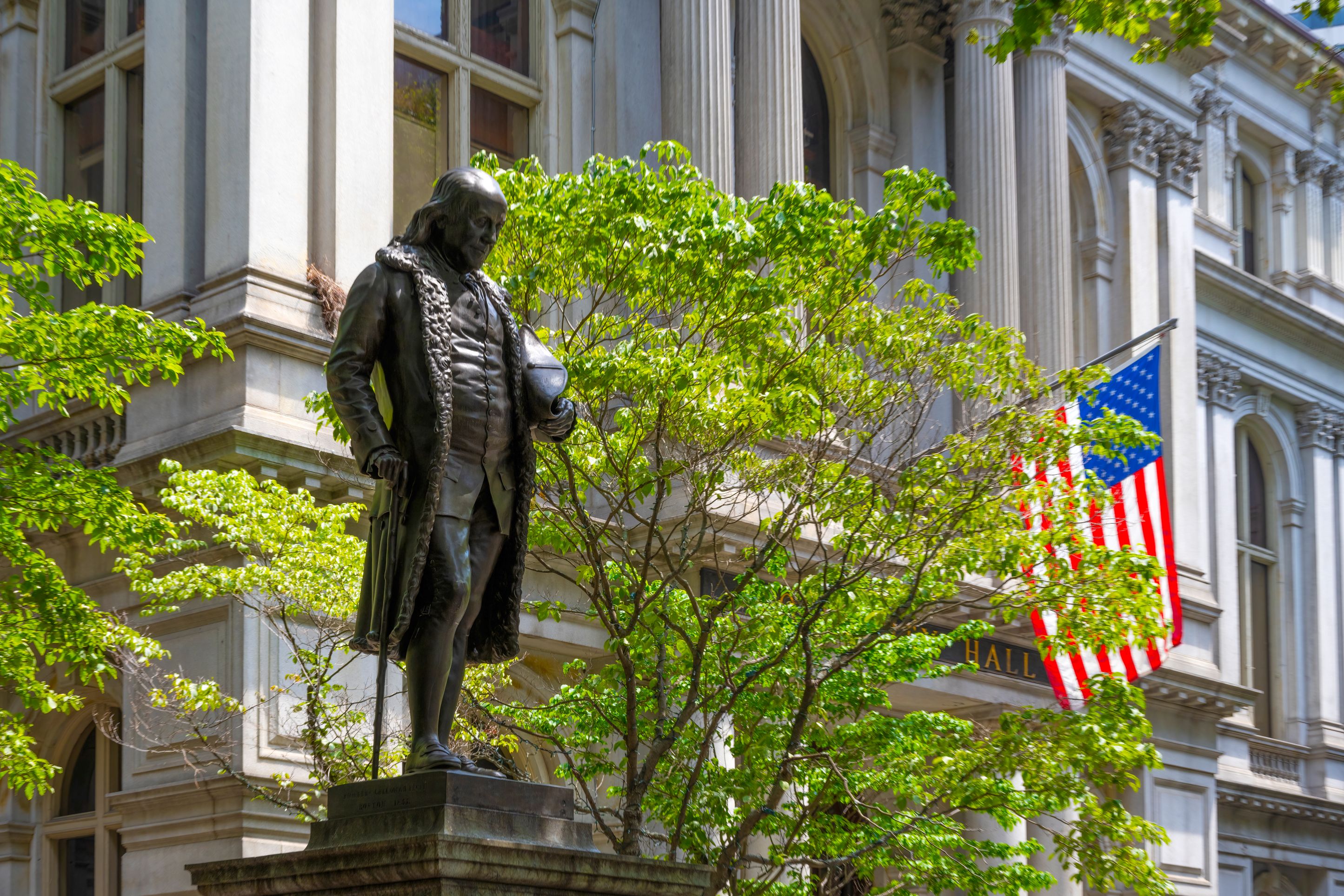 Statue of Benjamin Franklin in front of Boston's former City Hall.